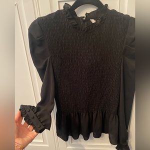 Black blouse WAYF with puff sleeve and antique bottoms for lovely detail